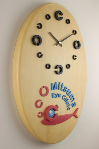 眼科様への開院祝いの掛け時計：「ランドルト環の文字盤」と「ロゴマーク」