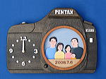 ご両親への記念品：「カメラの掛け時計」の詳細ページへ