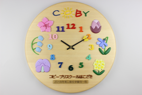 「コビープリスクールはこざき」様の直径４０センチの円形時計の詳細ページへ